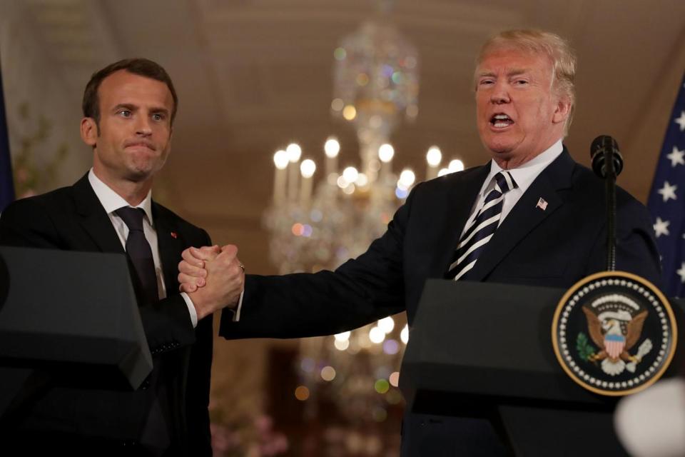 President Donald Trump shakes french President Emmanuel Macron's hand during a press conference at the White House (Getty Images)