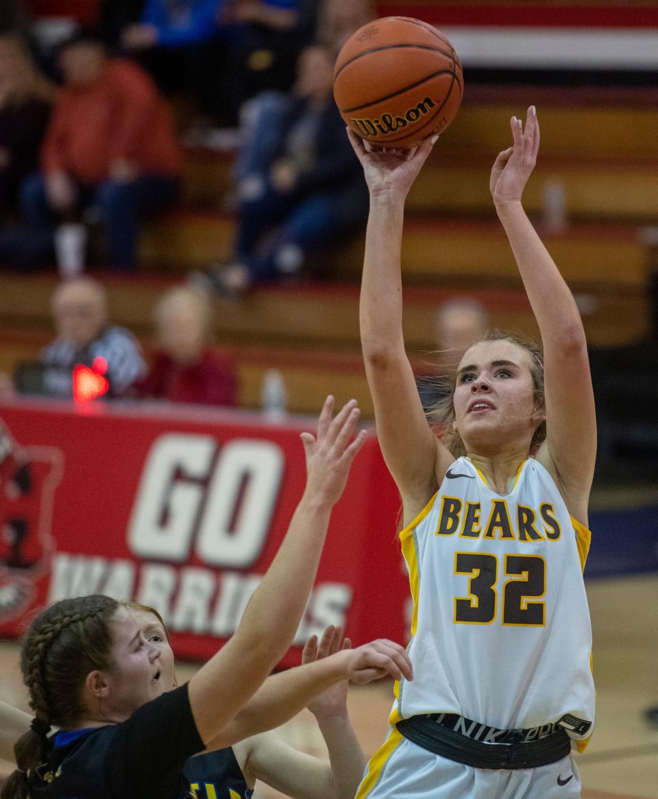 Central's Madalynn Shirley (32) takes a shot as the Central Bears play the Castle Knights during the first round of the 2023 IHSAA Class 4A Girls Basketball Sectional at Harrison High School in Evansville, Ind., Thursday, Feb. 2, 2023. 