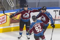 Colorado Avalanche's Nathan MacKinnon (29), Gabriel Landeskog (92) and Cale Makar (8) celebrate a goal against the Dallas Stars during first-period NHL Western Conference Stanley Cup playoff hockey game action in Edmonton, Alberta, Saturday, Aug. 22, 2020. (Jason Franson/The Canadian Press via AP)