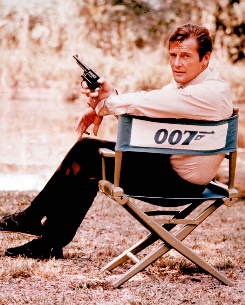 British actor Roger Moore, playing the title role of secret service agent 007, James Bond, is shown on location in England in 1972 - Credit: AP