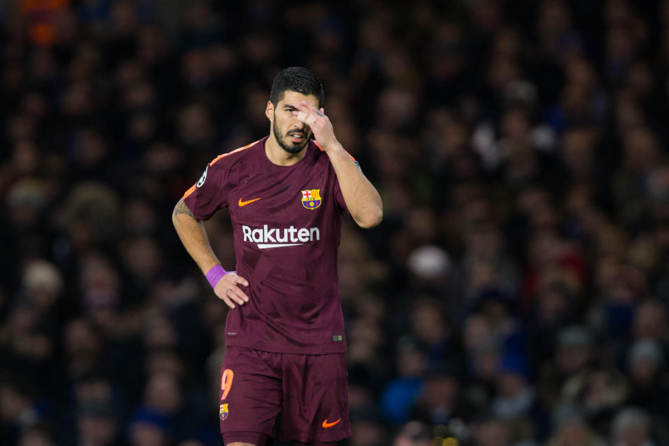 Luis Suarez reacts during the UEFA Champions League Round of 16 First Leg match between Chelsea FC and FC Barcelona