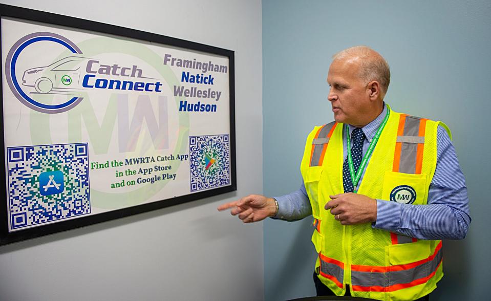 Jon Fetherston, manager of travel and training and community relations for the MetroWest Regional Transit Authority, explains the agency's Catch Connect program in his office, Sept. 7, 2022.