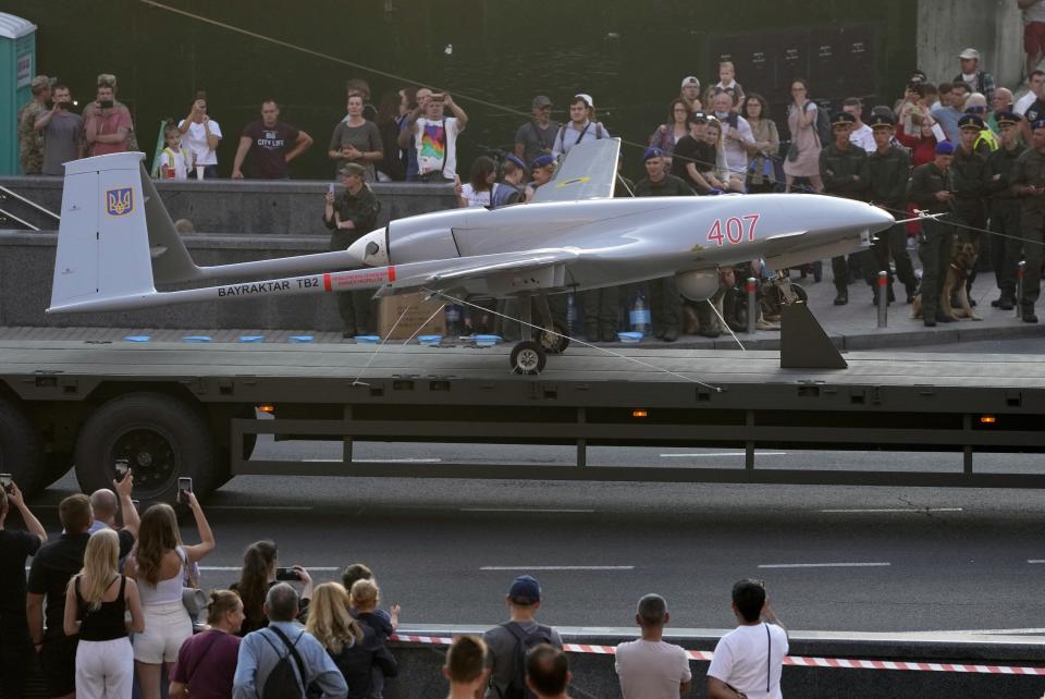 FILE - A Turkish-made Bayraktar TB2 drone is seen during a rehearsal of a military parade dedicated to Independence Day in Kyiv, Ukraine, Friday, Aug. 20, 2021. The Russian invasion of Ukraine is the largest conflict that Europe has seen since World War II, with Russia conducting a multi-pronged offensive across the country. The Russian military has pummeled wide areas in Ukraine with air strikes and has conducted massive rocket and artillery bombardment resulting in massive casualties. (AP Photo/Efrem Lukatsky, File)