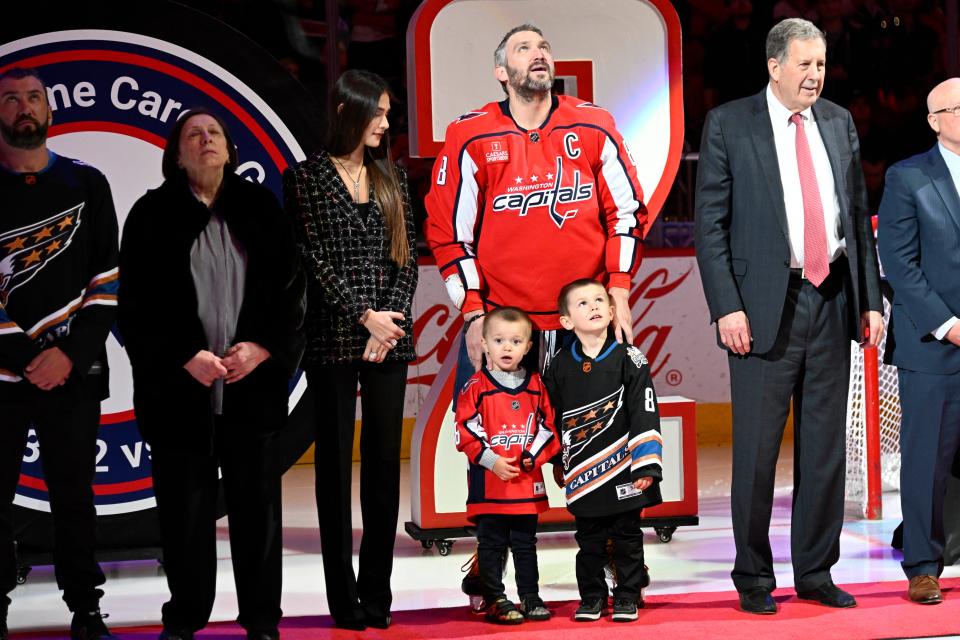 Mar 21, 2023; Washington, District of Columbia, USA; Washington Capitals left wing Alex Ovechkin (8) and family during a ceremony to honor scoring an NHL second best 802 career goal before the game against the Columbus Blue Jackets at Capital One Arena. Mandatory Credit: Brad Mills-USA TODAY Sports