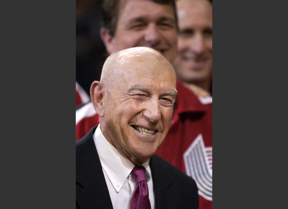 FILE - In this Sunday, April, 14, 2002, file photo, former Portland Trail Blazers coach Jack Ramsay smiles during a special 25th anniversary reunion of the Trail Blazers' 1976-77 championship team at halftime of their NBA basketball game against the Los Angeles Lakers, in Portland, Ore. Ramsay, a Hall of Fame coach who led the Portland Trail Blazers to the 1977 NBA championship before he became one of the league's most respected broadcasters, has died following a long battle with cancer. He was 89. (AP Photo/Shane Young, File)