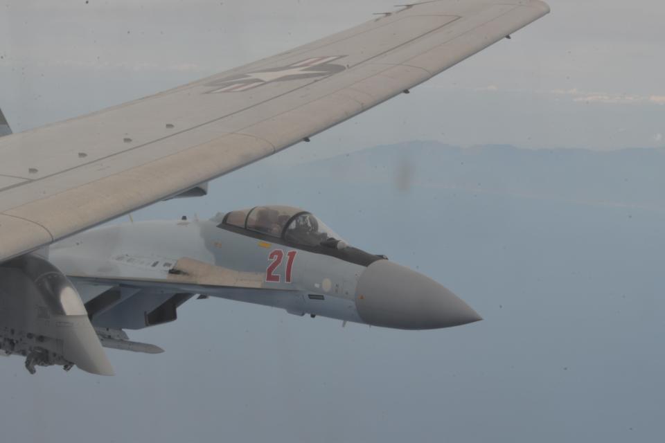 A Russian Su-35 'unsafely' intercepting a US Navy P-8A Poseidon patrol aircraft