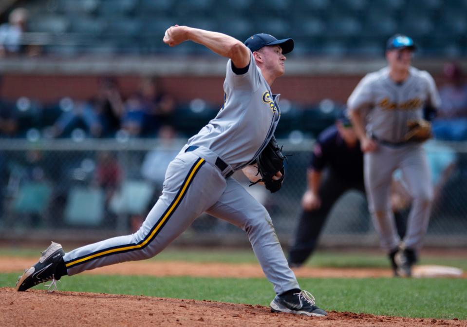 Castle's Cameron Tilly (15) delivers a pitch to a North batter during their sectional semifinal game at Bosse Field Saturday morning, May 28, 2022. Tilly gave up one hit in the five-inning 13-0 victory and struck out 10 batters.