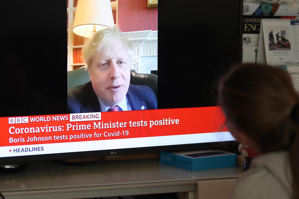 27/03/2020 in Pergine Valsugana, Italy. A girl looks at BBC World News giving the Breaking News of UK Prime Minister Boris Johnson tested positive at the Coronavirus Most part of Europe is today on a sweeping confinement to try to slow down the spread of the Covid-19 Pandemic. Boris Johnson, UK Prime Minister. (Photo by ESPA/Cal Sport Media/Sipa USA)