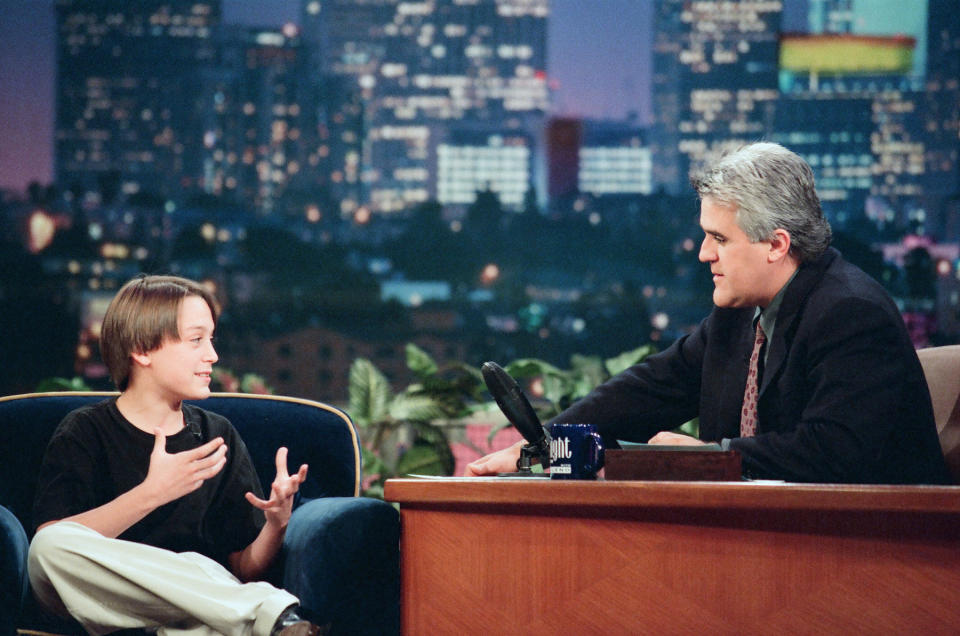 THE TONIGHT SHOW WITH JAY LENO -- Episode 1472 -- Pictured: (l-r) Actor Kieran Culkin during an interview with host Jay Leno on October 14, 1998 -- (Photo by: Margaret Norton/NBC/NBCU Photo Bank)