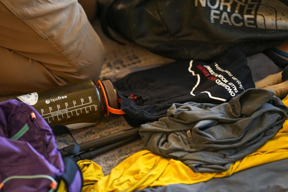 Branndon Bargo, Southwestern University's assistant director of outdoor adventure, lays out the gear to be packed for his Mount Kilimanjaro journey.
