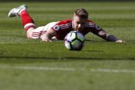 Britain Football Soccer - Middlesbrough v Burnley - Premier League - The Riverside Stadium - 8/4/17 Middlesbrough's Adam Clayton looks at the ball while laying on the pitch Action Images via Reuters / Craig Brough Livepic