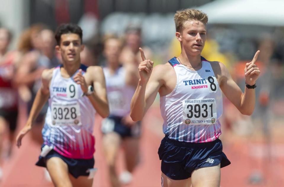 Trinity’s Clay Shively wins the class 3A 1600 meter run at the state track and field championships at Cessna Stadium on Saturday. Trinity finshed 1-2-3 in the event. 