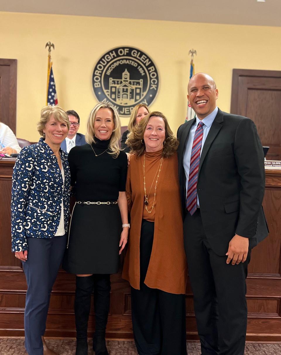 Glen Rock councilwoman Paula Gilligan, second from left, was sworn in to her position along with fellow councilwoman Teresa Gilbreath Friday, Jan. 6, 2023. Assemblyperson Lisa Swain, far left, and Sen. Cory Booker, far right, administered the oath of office for the two women.