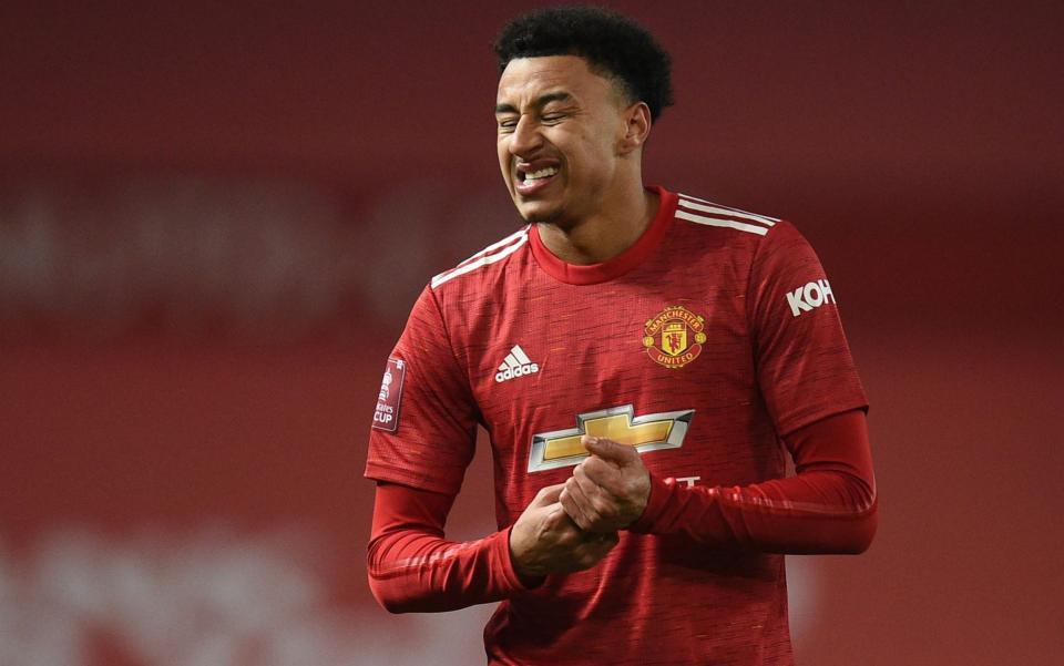 Jesse Lingard grimaces - AFP