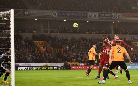 Jordan Henderson makes it 1-0 to Liverpool - Credit: Getty Images