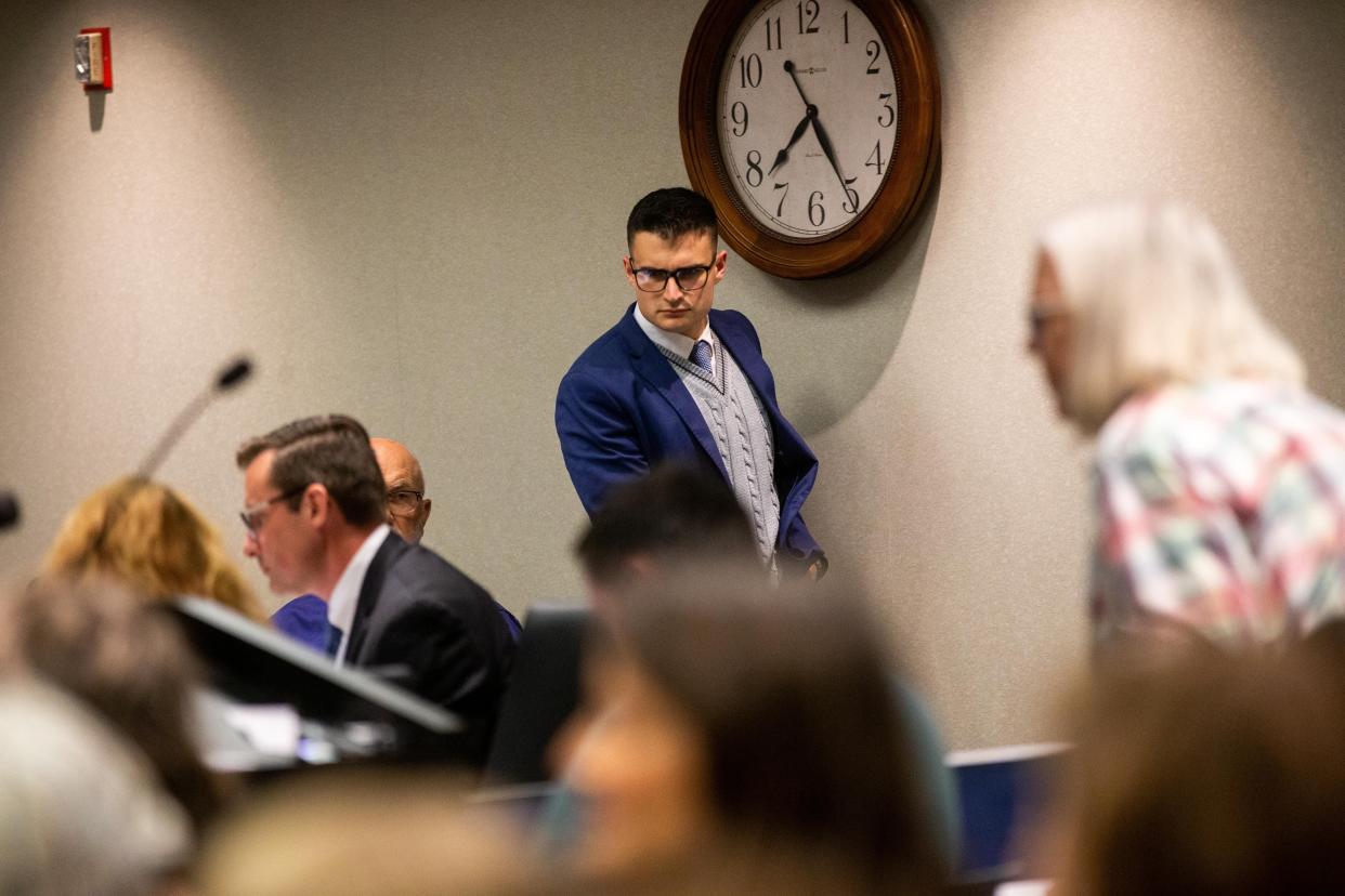 Jordan Epperson walks to his seat Tuesday, Sept. 26, 2023, at the county offices in West Olive.