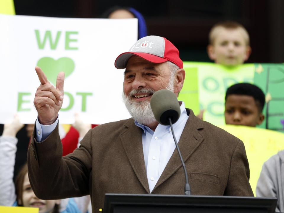 ECOT founder Bill Lager speaks during a rally staged by the now-closed online charter school outside the Statehouse in May 2017.