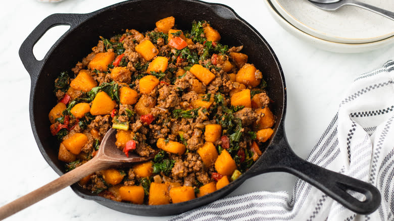 Beef and butternut squash in skillet