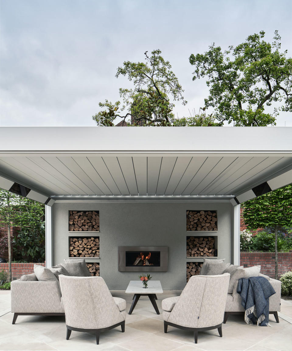 13. Embrace coziness in a north-facing garden with a fireplace