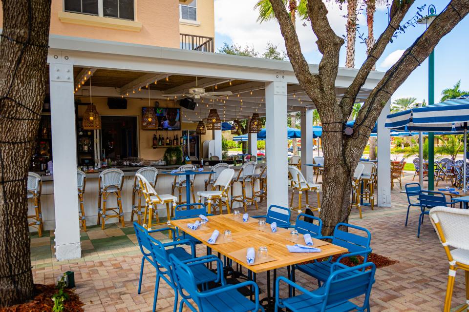 Scusi Trattoria offers indoor and outdoor seating.