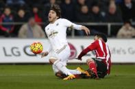 Football Soccer - Swansea City v Southampton - Barclays Premier League - Liberty Stadium - 13/2/16 Swansea's Alberto Paloschi in action with Southampton's Maya Yoshida Mandatory Credit: Action Images / Peter Cziborra Livepic