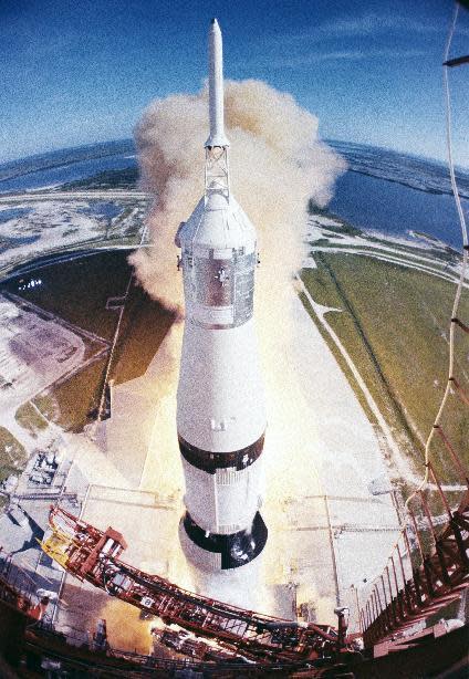 FILE - In this July 26, 1971 photo provided by NASA, the Apollo 15 space vehicle as it lifts off from Launch Complex 39A at Kennedy Space Center in Fla. Dormant for nearly six years, Launch Complex 39A at NASA’s Kennedy Space Center should see its first commercial flight on Feb. 18, 2017. A SpaceX Falcon 9 rocket will use the pad to hoist supplies for the International Space Station. (NASA via AP)