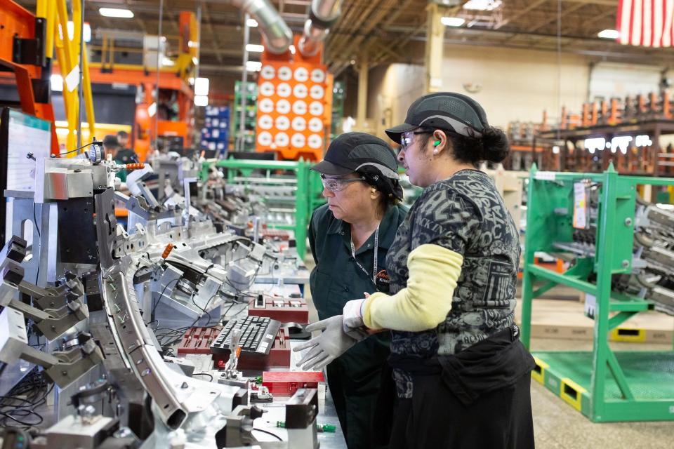 Employees of Shape Corp. during a shift at one of the company's manufacturing plants in Grand Haven, Michigan.