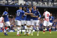 Football Soccer Britain - Everton v Stoke City - Premier League - Goodison Park - 27/8/16 Everton's Leighton Baines celebrates their first goal with teammates Action Images via Reuters / Ed Sykes Livepic EDITORIAL USE ONLY. No use with unauthorized audio, video, data, fixture lists, club/league logos or "live" services. Online in-match use limited to 45 images, no video emulation. No use in betting, games or single club/league/player publications. Please contact your account representative for further details.