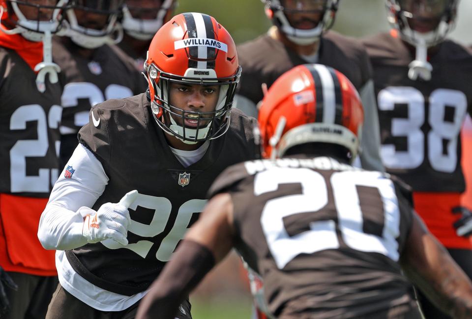 Cleveland Browns cornerback Greedy Williams, facing, participates in drills with Greg Newsome II during NFL football training camp, Friday, July 30, 2021, in Berea, Ohio.