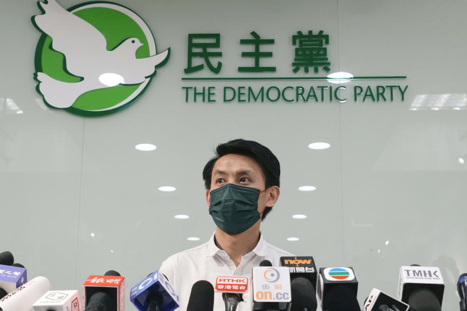 FILE - Democratic Party chairman Lo Kin-hei speaks during a press conference at party's headquarters in Hong Kong on Sept. 26, 2021. The city’s largest pro-democracy party, the Democratic Party, will be absent in the district council election in November 2023 for the first time since its establishment in 1994. The party chairman Lo Kin-hei said he and other members could not secure enough nominations under the new rules authorities introduced to ensure “patriots administering Hong Kong." Other smaller groups from the camp had the same problem. (AP Photo/Vincent Yu, File)