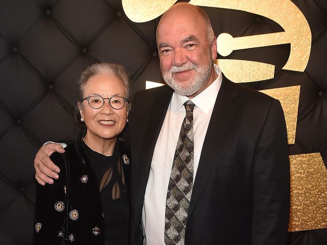 <p>Alberto E. Rodriguez/Getty </p> Peter and Mutsuko Erskine at the 59th GRAMMY Awards on February 12, 2017 in Los Angeles, California.