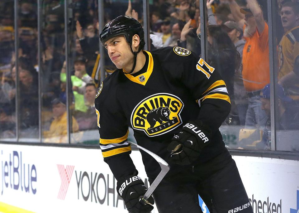 BOSTON, MA - MARCH 28:   Milan Lucic #17 of the Boston Bruins reacts after his first of two goals in the first period against the New York Rangers at the TD Garden on March 28, 2015 in Boston, Massachusetts.  (Photo by Jim Rogash/Getty Images)