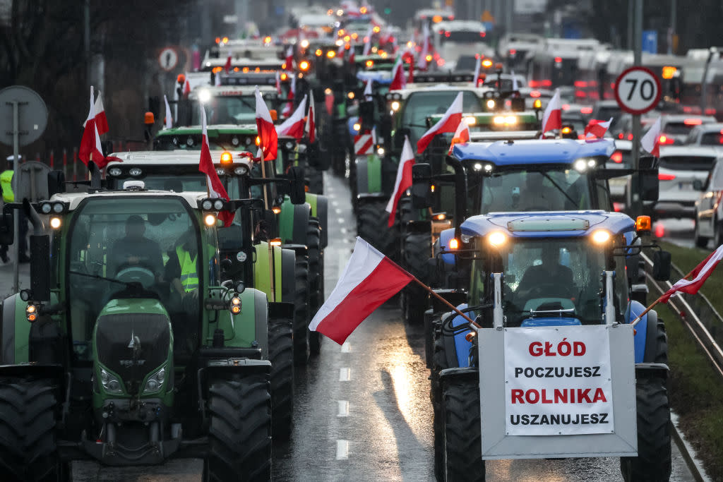  Farmers enter Krakow, Poland, in tractors with Polish national flags during the nationwide farmers' strike on February 20, 2024. The protest is part of the European farmers' protest against the EU Green Deal regulations. Polish farmers also demand a change to the EU agreement with Ukraine regarding the import of agricultural produce to the EU. 