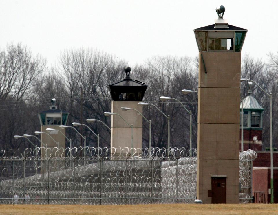 Guard towers and razor wire ring the compound at the U.S. Penitentiary in Terre Haute, Ind.