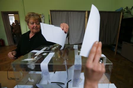 A woman votes in a polling station during parliamentary elections in Sofia, Bulgaria March 26, 2017. REUTERS/Laszlo Balogh