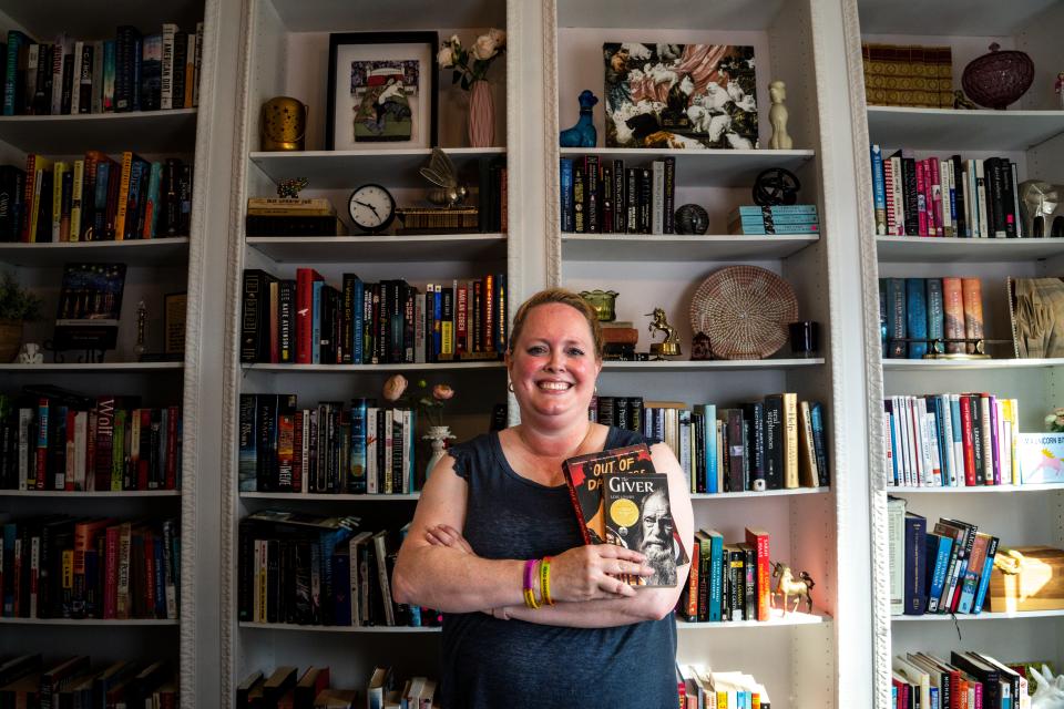 Sara Hayden Parris, founder and president of Annie's Foundation, stands for a portrait in her home library on Thursday, Aug. 3, 2023, in Johnston.
