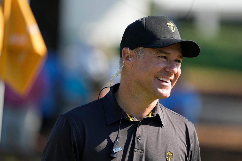 International team captain Trevor Immelman walks on the fifth green during practice for the Presidents Cup golf tournament at the Quail Hollow Club, Tuesday, Sept. 20, 2022, in Charlotte, N.C. (AP Photo/Chris Carlson)