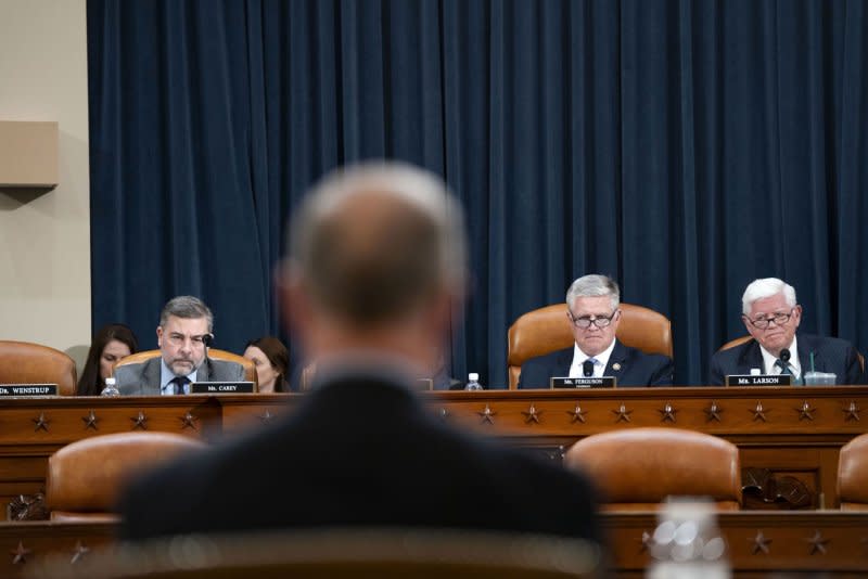 Rep. Mike Carey, R-Ohio, Rep. Drew Ferguson, R-Ga., and Rep. John Larson, D-Conn., look on as Commissioner of the Social Security Administration Martin O'Malley speaks during a House Ways and Means Subcommittee on Social Security hearing on Thursday. Photo by Bonnie Cash/UPI