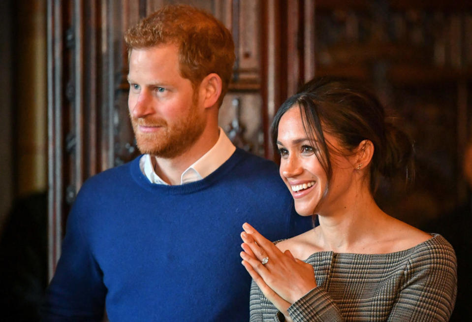 <p>As Prince Harry and Meghan Markle stepped indoors, the former actress revealed that she was wearing a checked cold-shoulder jacket by Theory beneath her Stella McCartney coat. And the plaid look referenced Princess Diana’s love of check. And the cold-shoulder cut was a bold take on the beloved print.<br>Meghan finished the look with a pair of Huit Denim skinny jeans, another rule-breaking choice for the royal-to-be. <em>[Photo: Getty]</em> </p>