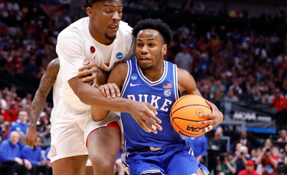 Duke’s Jeremy Roach (3) drives against Houston’s Cedric Lath (2) during the first half of Duke’s game against Houston in their NCAA Tournament Sweet 16 game at the American Airlines Center in Dallas, Texas, Friday, March 29, 2024.