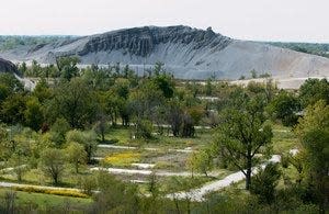 Empty lots and a mountain of chat are all that is left in most of Picher. GARY CROW / For the Tulsa World