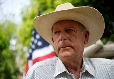 FILE PHOTO: Rancher Cliven Bundy poses at his home in Bunkerville, Nevada, U.S., April 11, 2014. REUTERS/Jim Urquhart/File Photo