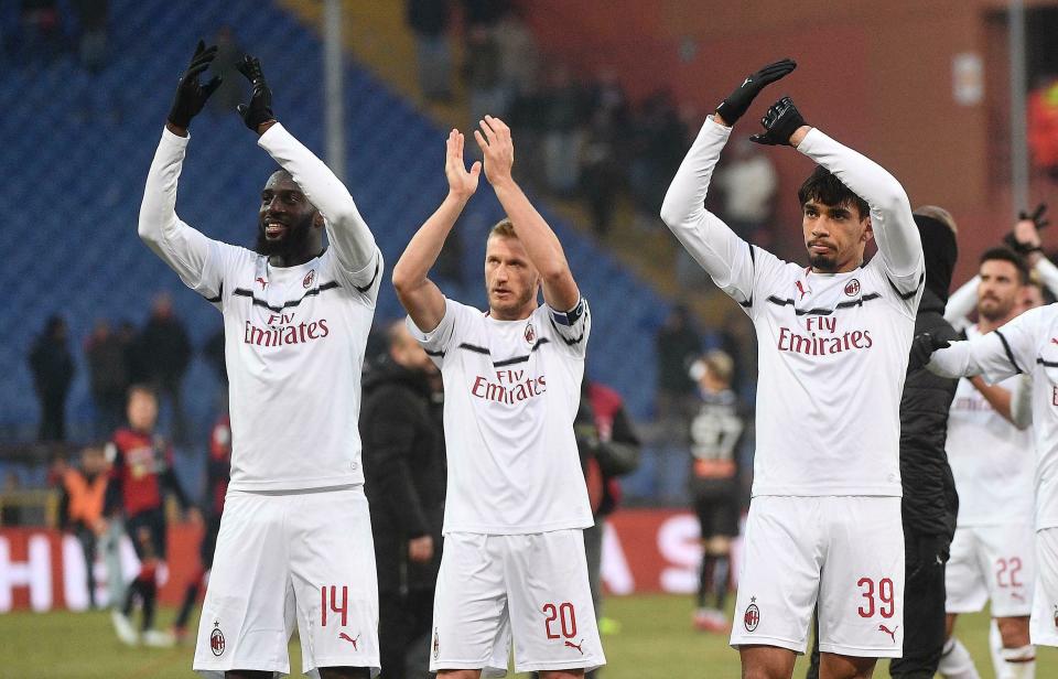 AC Milan's Tiemoue Bakayoko, Ignazio Abate and Lucas Paqueta applaud fans at the end of the Serie A soccer match Genoa CFC vs AC Milan at the Luigi Ferraris stadium in Genoa, Italy, Monday, Jan. 21, 2019. AC Milan won 2-0. (Luca Zennaro/ANSA via AP)