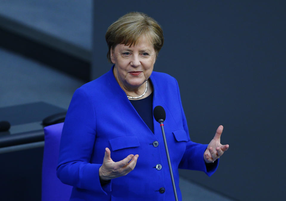 BERLIN, GERMANY - MAY 13: German Chancellor Angela Merkel speaks during a session held with the members of parliament on precautions to combat the novel coronavirus (COVID-19) and loosening the measures at the Bundestag Germany's parliament in Berlin, Germany, on May 13, 2020. (Photo by Abdulhamid Hosbas/Anadolu Agency via Getty Images)