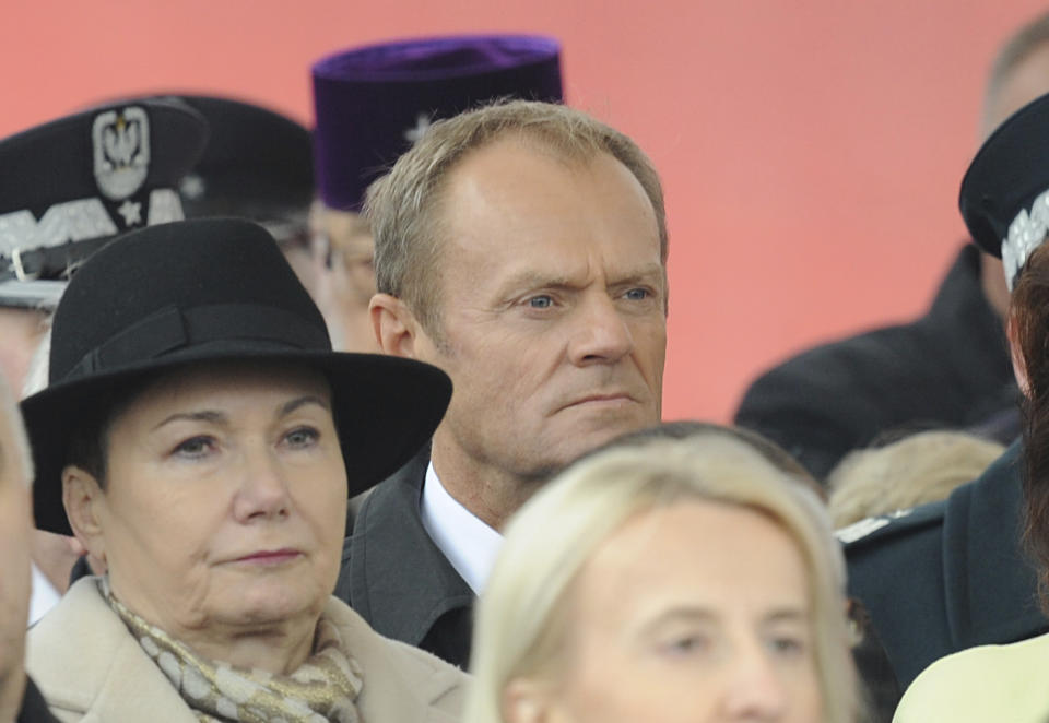 European Council President Donald Tusk, center, attends the official ceremony marking Poland's Independence Day, in Warsaw, Poland, Sunday, Nov. 11, 2018. Tusk joined celebrations in his native Poland on Independence Day, which celebrates the nation regaining its sovereignty at the end of World War I after being wiped off the map for more than a century. (AP Photo/Alik Keplicz)