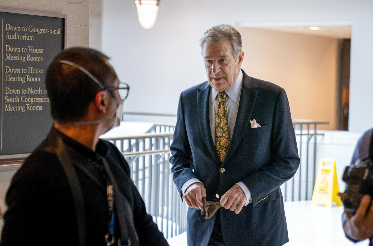 FILE - Paul Pelosi, right, the husband of House Speaker Nancy Pelosi, of California, follows his wife as she arrives for her weekly news conference on Capitol Hill in Washington, Thursday, March 17, 2022. Authorities say Paul Pelosi was arrested on suspicion of DUI in Northern California, late Saturday, May 28, 2022, in Napa County. He could face charges including driving under the influence. Bail was set at $5,000. (AP Photo/Andrew Harnik, File)