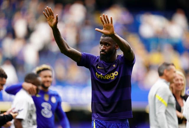 Antonio Rudiger applauds the fans