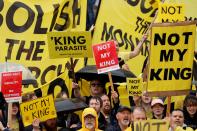 <p>People protest on the day of the coronations of Britain's King Charles III and Britain's Camilla, Queen Consort, in London on May 6, 2023. - The set-piece coronation is the first in Britain in 70 years, and only the second in history to be televised. Charles will be the 40th reigning monarch to be crowned at the central London church since King William I in 1066. Outside the UK, he is also king of 14 other Commonwealth countries, including Australia, Canada and New Zealand. Camilla, his second wife, will be crowned queen alongside him, and be known as Queen Camilla after the ceremony. (Photo by PIROSCHKA VAN DE WOUW / POOL / AFP) (Photo by PIROSCHKA VAN DE WOUW/POOL/AFP via Getty Images)</p> 