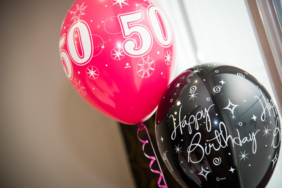 Red and black balloons for a 50th Birthday Party