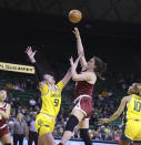 Oklahoma center Beatrice Culliton (0) shoots over Baylor forward Caitlin Bickle (51) during the first half of an NCAA college basketball game Tuesday, Feb. 7, 2023, in Waco, Texas. (Rod Aydelotte/Waco Tribune-Herald via AP)